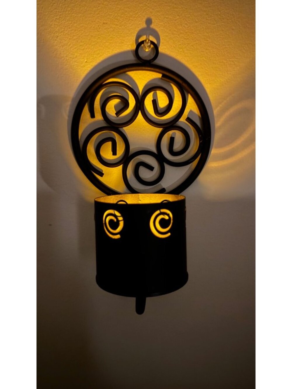 Black metal wall candle sconce